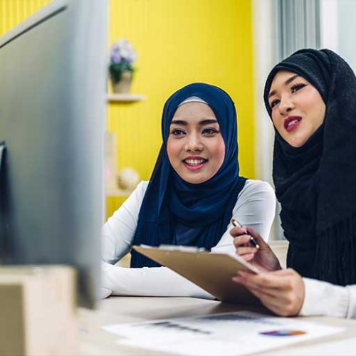 muslim-owners-working-laptop sensolution and our quality